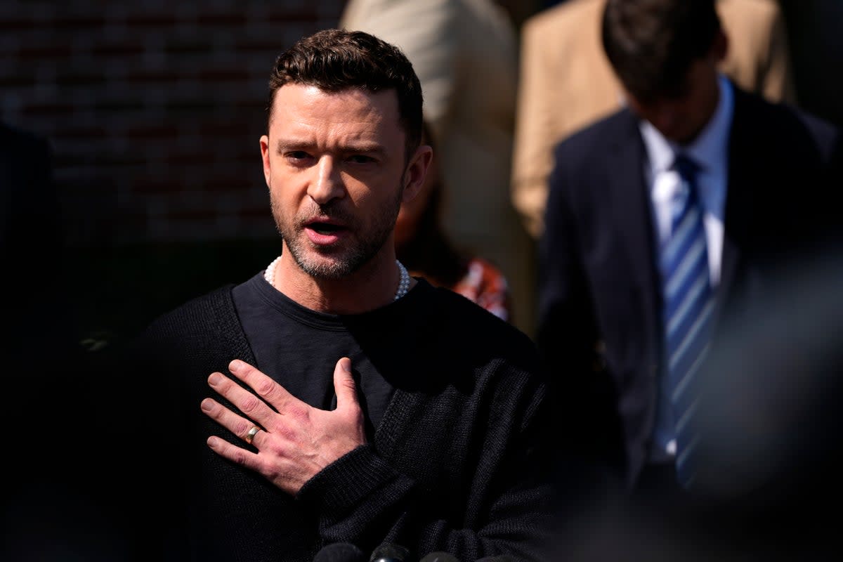 Justin Timberlake speaks to the press after a court hearing on Friday (AP)