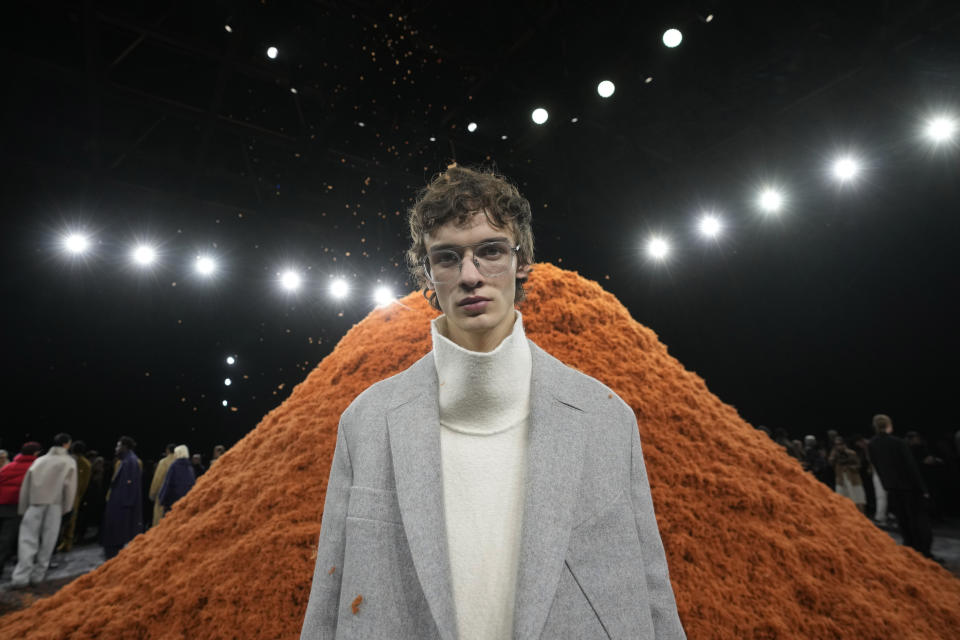 A model wears a creation part of the Zegna men's Fall-Winter 2024-2025 collection, that was presented in Milan, Italy, Monday, Jan. 15, 2024. (AP Photo/Luca Bruno).