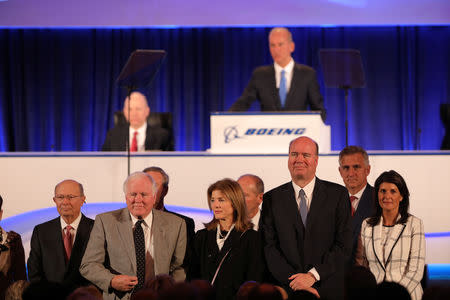 The Boeing board of directors, including Nikki Haley (right) and Caroline Kennedy (3rd from right), is announced by Chief Executive Officer Dennis Muilenburg during at the Boeing Annual General Meeting in Chicago, Illinois, U.S. April 29, 2019. REUTERS/John Gress