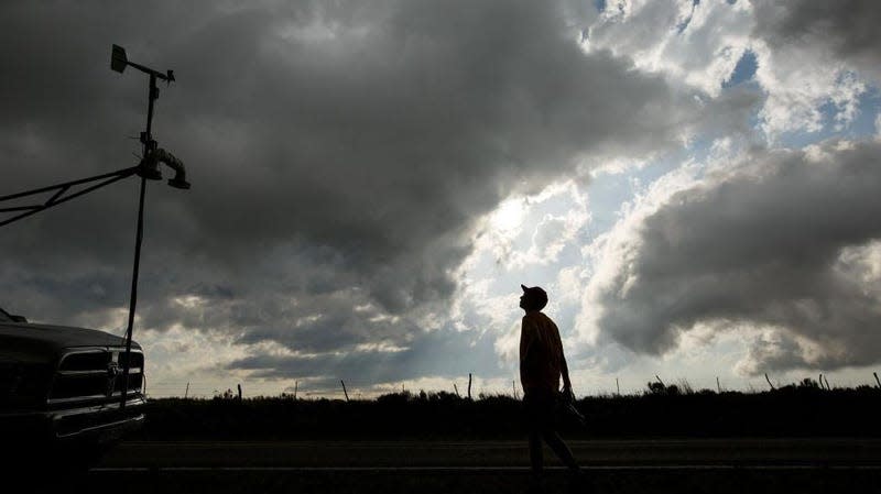 Center for Severe Weather Research intern Hunter Anderson views cloud activity at the end of a severe thunderstorm, May 10, 2017 in Texas.