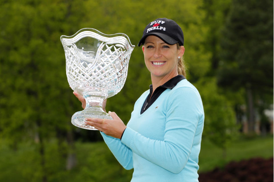 Cristie Kerr holds the trophy after winning the 2013 Kingsmill Championship at Kingsmill Resort in Williamsburg, Virginia. (Photo by Hunter Martin/Getty Images)