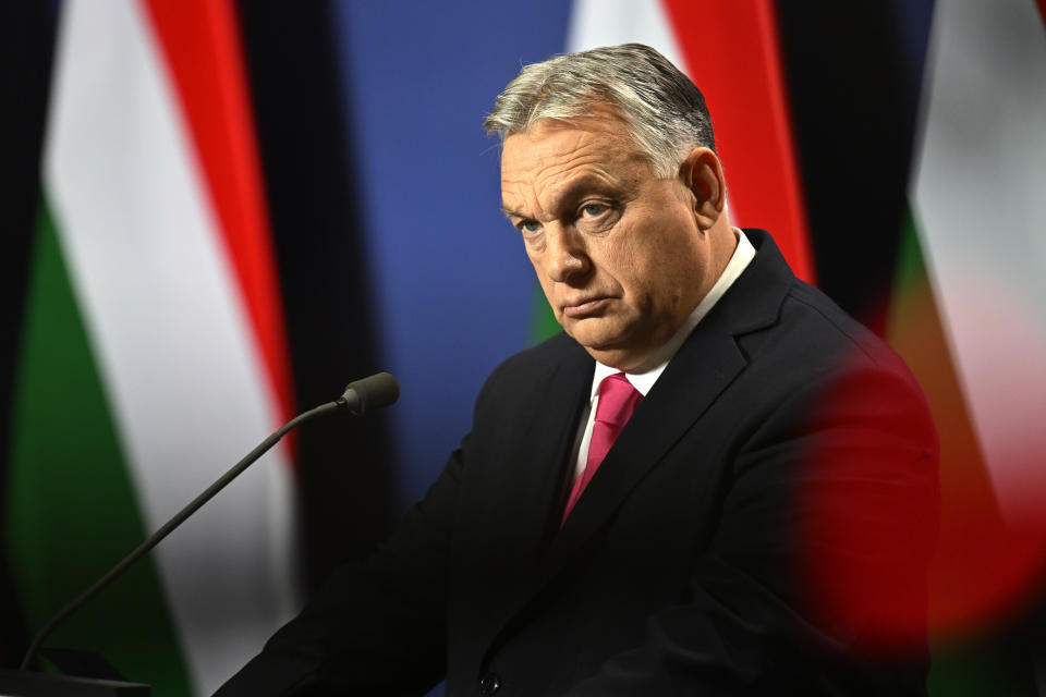 FILE - Hungarian Prime Minister Viktor Orban arrives for an annual international press conference in Budapest, Hungary, Thursday, Dec. 21, 2023. Swedish Prime Minister Ulf Kristersson tells his Hungarian counterpart Viktor Orbán that more dialogue would be beneficial after Orbán invited the Swede to Budapest to discuss Sweden's NATO accession. (AP Photo/Denes Erdos, File)
