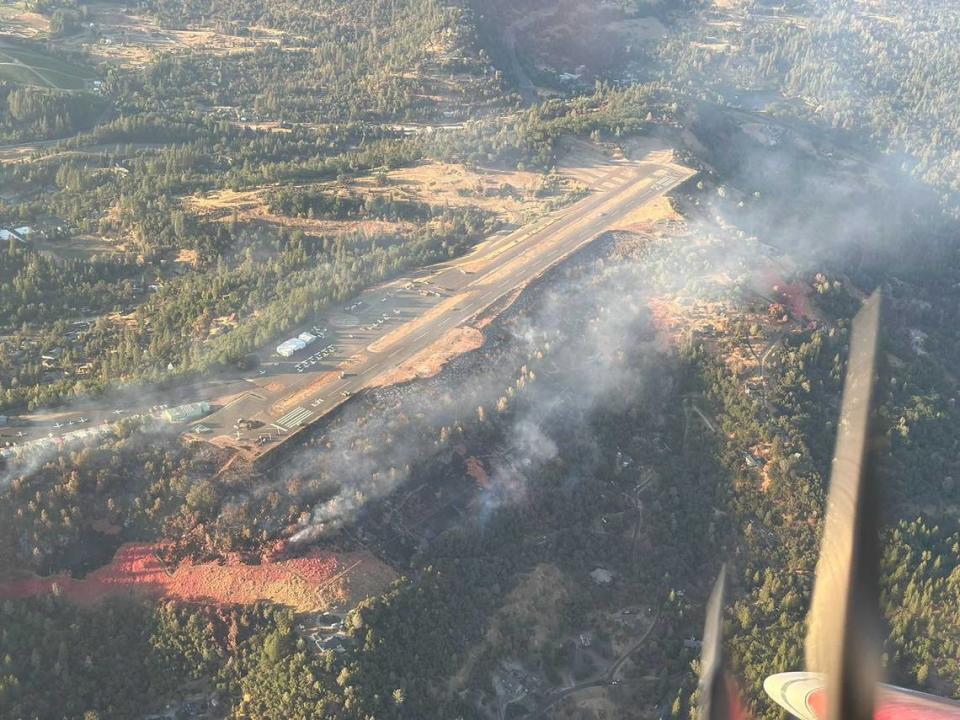 Retardant and dozer lines are seen around Placerville Airport on Saturday, July 7, 2024, as crews worked to control the Pay Fire. On Sunday, firefighters said the fire’s forward progress had been stopped after it chewed through 77 acres in El Dorado County.