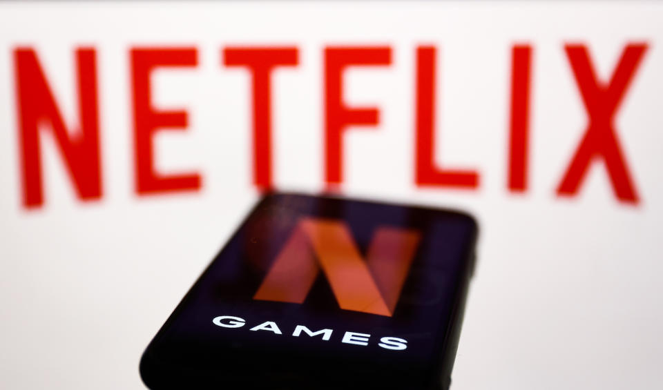 Netflix Games logo displayed on a phone screen and Netflix logo displayed on a screen are seen in this illustration photo taken in Krakow, Poland on September 29, 2022. (Photo by Jakub Porzycki/NurPhoto)