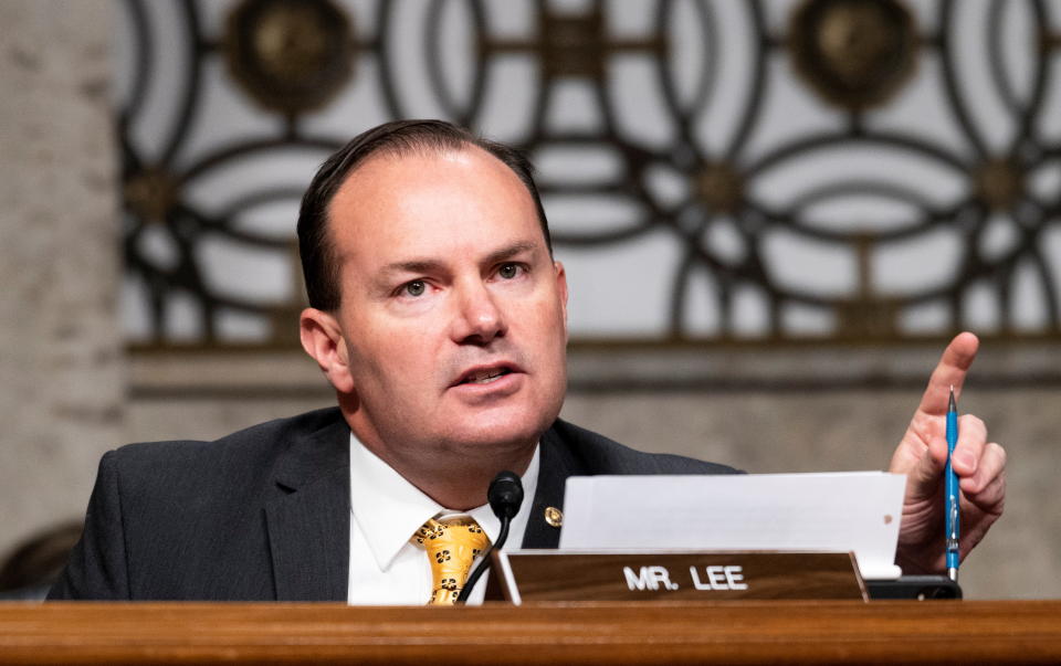 U.S. Senator Mike Lee of Utah, questions Mark Zuckerberg, Chief Executive Officer of Facebook, and Jack Dorsey, Chief Executive Officer of Twitter, during the Senate Judiciary Committee hearing on "Breaking the News: Censorship, Suppression, and the 2020 Election", in Washington, U.S., November 17, 2020. Bill Clark/Pool via REUTERS