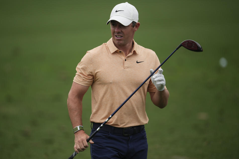 Rory McIlroy, of Northern Ireland, works out on the range during a practice for the Masters golf tournament at Augusta National Golf Club, Tuesday, April 4, 2023, in Augusta, Ga. (AP Photo/Matt Slocum)