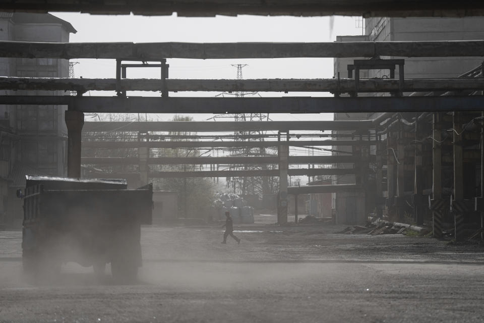 A worker walks at DTEK's power plant which was destroyed by a Russian missile attack in Ukraine, on Monday, April 1, 2024. Russia is attacking Ukraine’s energy sector with renewed intensity and alarming accuracy, signaling to Ukrainian officials that Russia is armed with better intelligence and fresh tactics in its campaign to annihilate the country’s power generation capacity. (AP Photo/Evgeniy Maloletka)