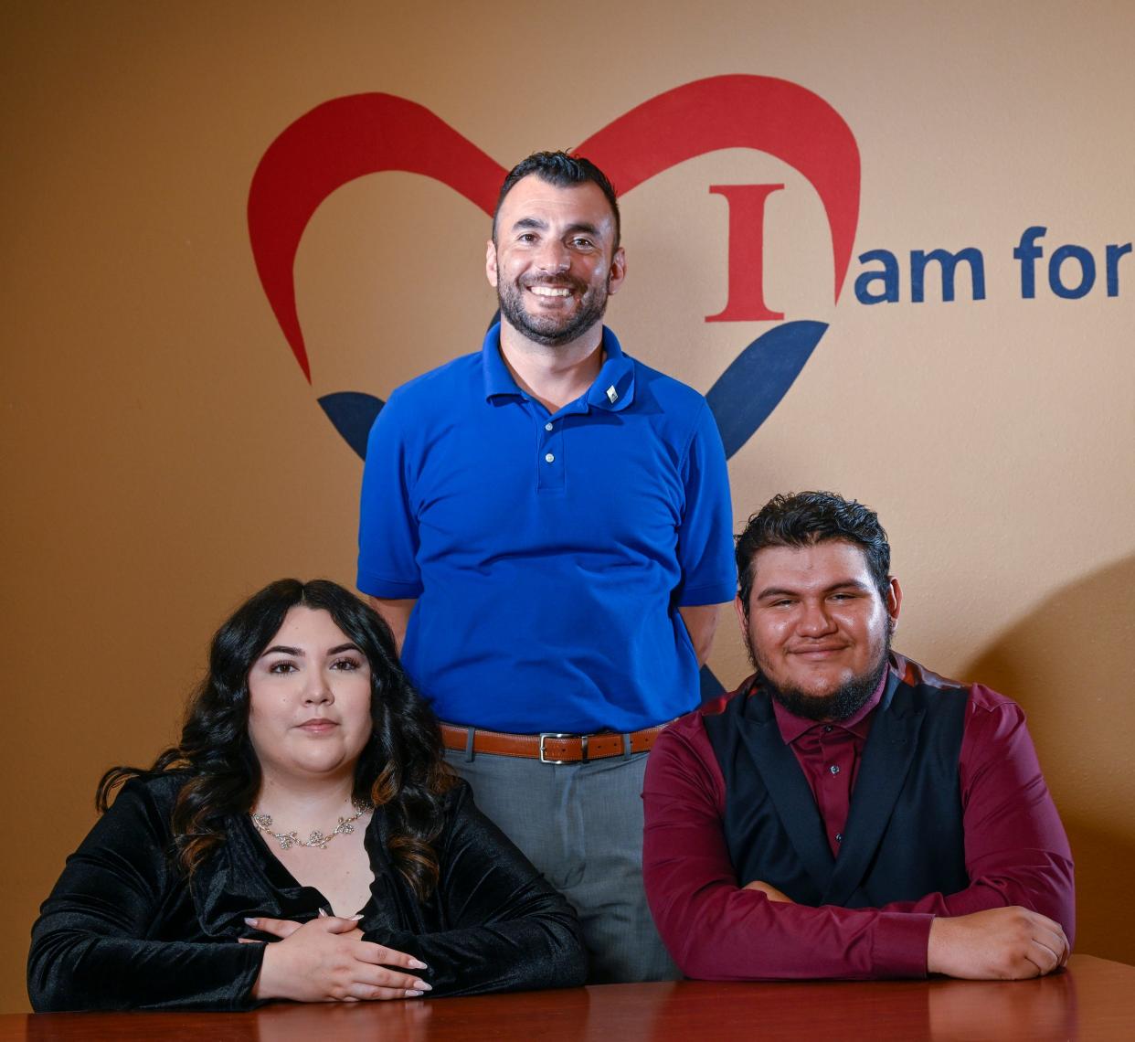 CASA Executive Director Alberto Ramos, center with former foster children Cheyenne Droney, left, and Saul Zavala are scheduled to speak during CASA's annual gala about how CASA volunteers helped them.