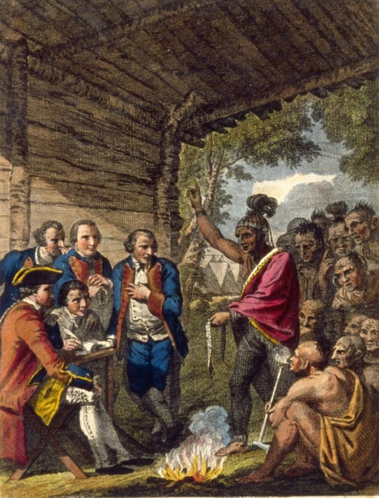 Illustration of Native Americans and British settlers on opposite sides, with a small fire between them