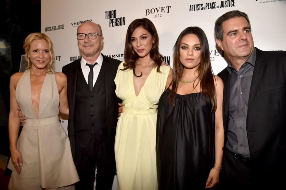 <div class="inline-image__caption"><p>(L-R) Maria Bello, Paul Haggis, Moran Atias, Mila Kunis, and producer Michael Nozik attend the premiere of <em>Third Person</em>, Haggis’ last major movie credit.</p></div> <div class="inline-image__credit">Kevin Winter</div>