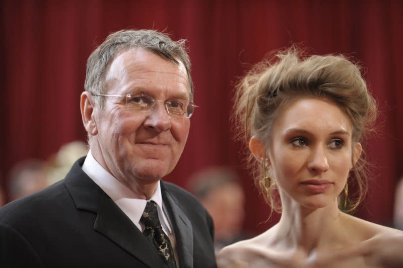 Tom Wilkinson and his guest arrive for the 80th Annual Academy Awards at the Kodak Theatre in Hollywood in 2008. File Photo by Phil McCarten/UPI