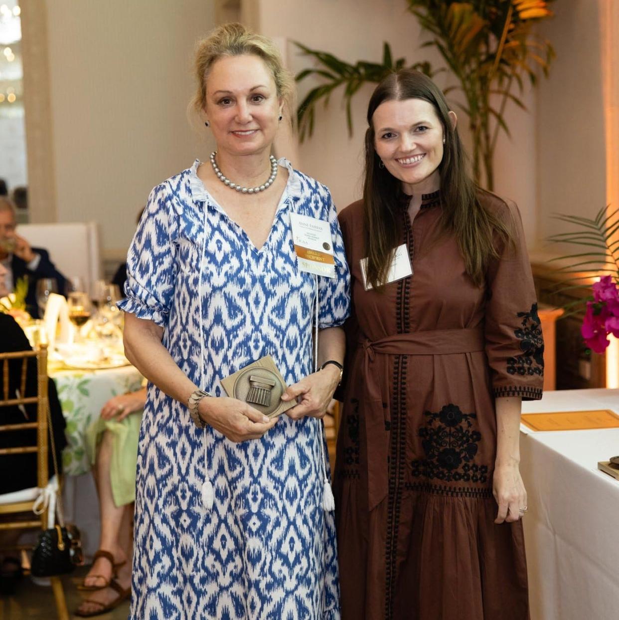 Anne Fairfax, left, of Fairfax & Sammons Architects, with Kristin Kellogg, Florida chapter president of the Institute of Classical Architecture & Art, celebrates her firm's four awards at the 11th annual juried competition sponsored by the ICAA.
(Photo: [CAPEHART])