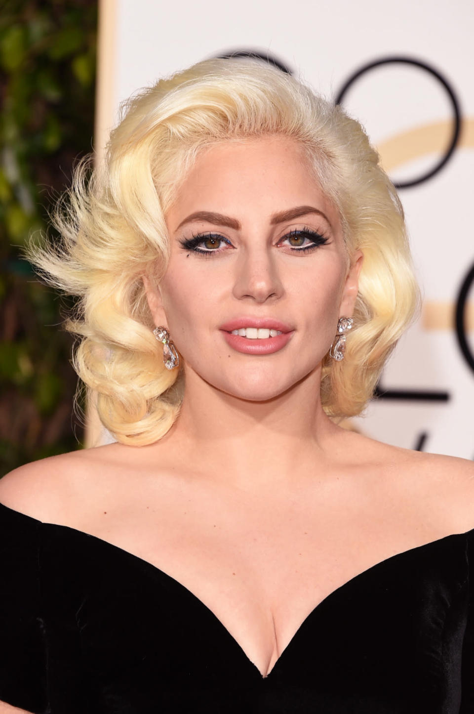 <p>Nothing is surprising when it comes to Lady Gaga — and her Marilyn Monroe-inspired blond waves were both classic and bold. <i>(Photo: Getty Images)</i></p>