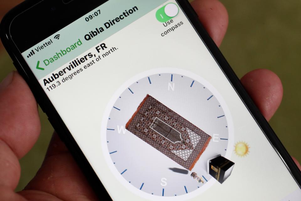 A Qibla compass on a smartphone which shows the direction to Mecca and where Muslims should pray.