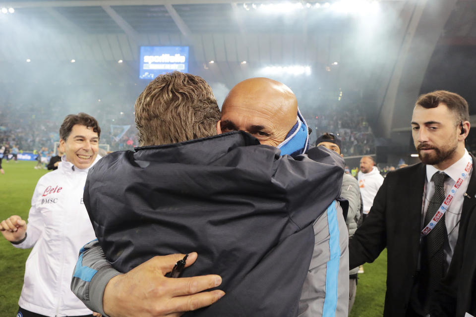 Napoli's head coach Luciano Spalletti celebrates at the end of the Serie A soccer match between Udinese and Napoli at the Dacia Arena in Udine, Italy, Thursday, May 4, 2023. Napoli won its first Italian soccer league title since the days when Diego Maradona played for the club, sealing the trophy with a 1-1 draw at Udinese on Thursday. (Andrea Bressanutti/LaPresse via AP)