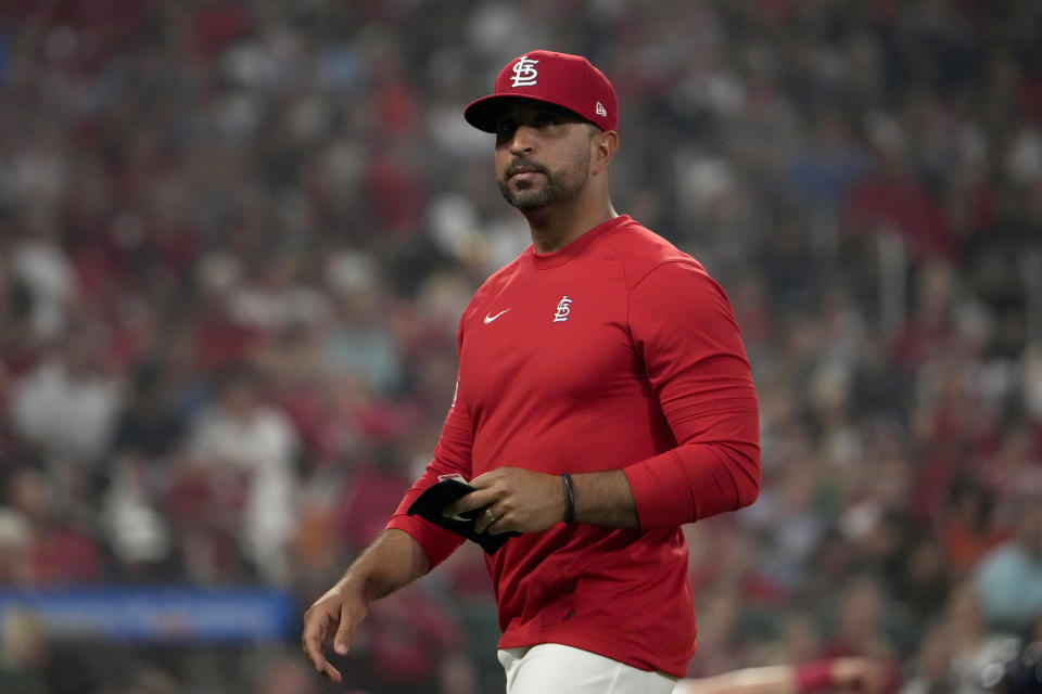 St. Louis Cardinals manager Oliver Marmol walks back from the mound after making a pitching change during the seventh inning of a baseball game against the Houston Astros Tuesday, June 27, 2023, in St. Louis. (AP Photo/Jeff Roberson)