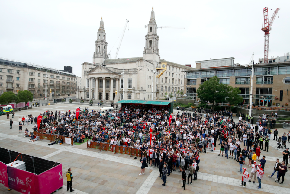 Fans gather to watch the game in Millennium Square in Leeds, where many people failed to turn up for work the next day (Picture: PA)