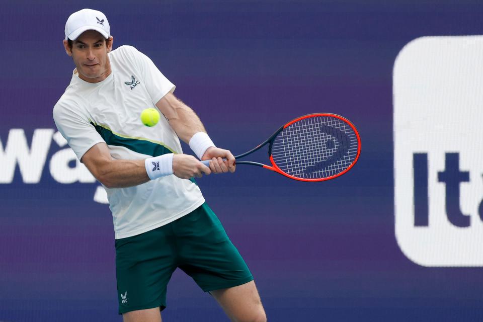 Andy Murray hits a backhand against Dusan Lajovic during the Miami Open.