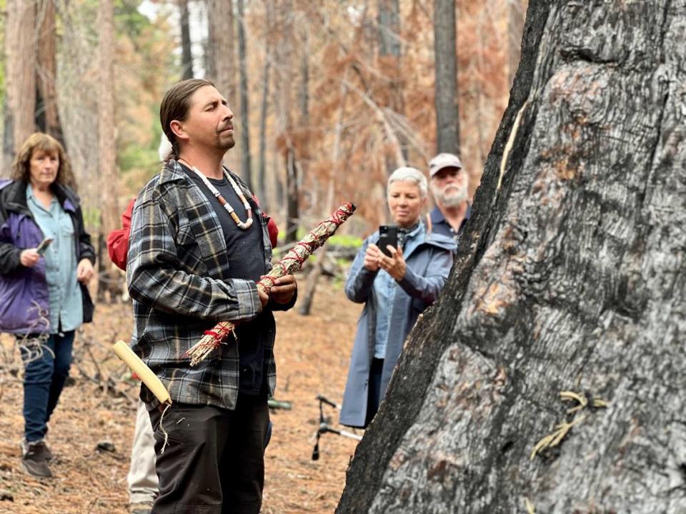 Adam Lewis, leader of the Calaveras band of Mi-Wuk Indians, sings Native songs and prays for The Orphans’ survival Sunday at Calaveras Big Trees State Park. Dominique Williams/The Modesto Bee