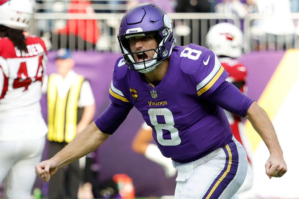 MINNEAPOLIS, MINNESOTA - OCTOBER 30: Kirk Cousins #8 of the Minnesota Vikings celebrates a touchdown during the second half against the Arizona Cardinals at U.S. Bank Stadium on October 30, 2022 in Minneapolis, Minnesota. (Photo by David Berding/Getty Images)