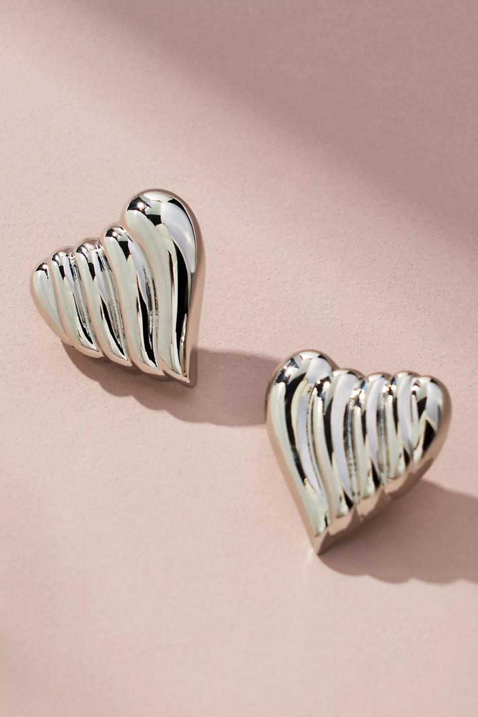 <p><a href="https://go.redirectingat.com?id=74968X1596630&url=https%3A%2F%2Fwww.anthropologie.com%2Fshop%2Fribbed-heart-post-earrings&sref=https%3A%2F%2Fwww.thepioneerwoman.com%2Ffashion-style%2Fg46298031%2Fvalentines-day-jewelry%2F" rel="nofollow noopener" target="_blank" data-ylk="slk:Shop Now;elm:context_link;itc:0;sec:content-canvas" class="link ">Shop Now</a></p><p>Ribbed Heart Post Earrings</p><p>anthropologie.com</p><p>$38.00</p><span class="copyright">Anthropologie</span>