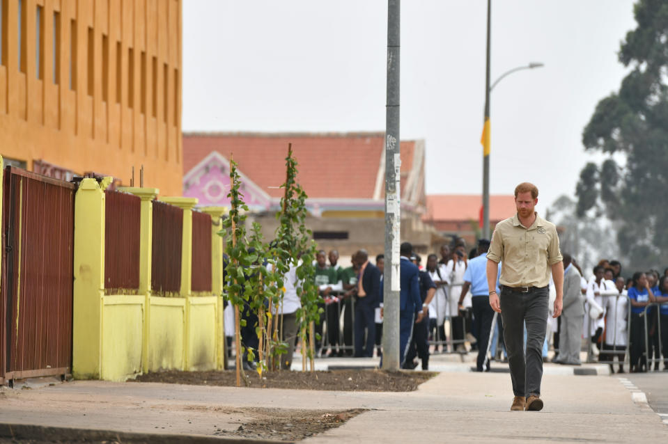 The Duke of Sussex walks on Princess Diana Street in Huambo, Angola, on day five of the royal tour of Africa. The Duke is visiting the minefield where his late mother, the Princess of Wales, was photographed in 1997, which is now a busy street with schools, shops and houses.