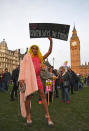 <p>An “Iraqi drag Queen” holds a placard during a protest against U.S. President Donald Trump in London, Feb. 20, 2017. (Photo: Justin Tallis/AFP/Getty Images) </p>