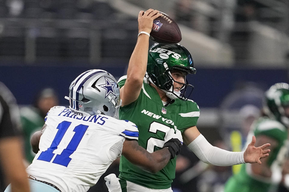 Micah Parsons (11) and the Cowboys never let Zach Wilson and the Jets get comfortable. (AP Photo/Tony Gutierrez)