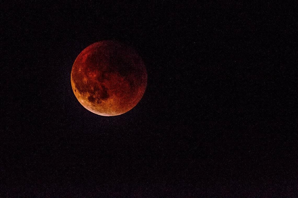 The most distinctive feature of a total lunar eclipse is how the moon turns blood red as it disappears into the Earth’s shadow. Photo taken Sept. 27, 2015.