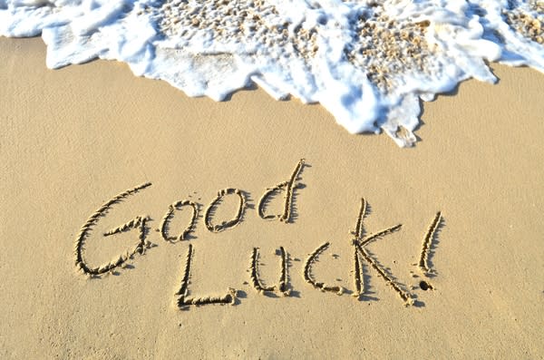 Good luck written in the sand