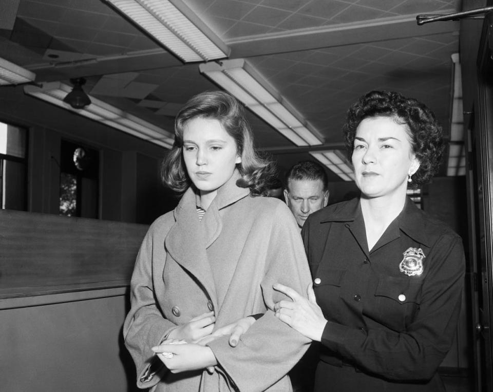 <div class="inline-image__caption"><p>Cheryl Crane (left) is escorted from jail to juvenile hall in Los Angeles by policewoman Margaret Weissberg. </p></div> <div class="inline-image__credit">Bettmann/Getty</div>