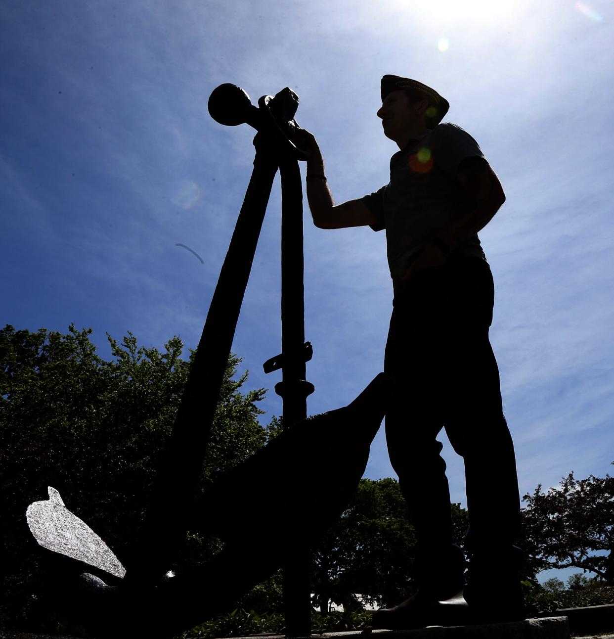 Army veteran and VFW Post 168 Commander Josh Denton stands at the huge anchor in Prescott Park in the area where the Burial at Sea will be held on Friday morning in Portsmouth.