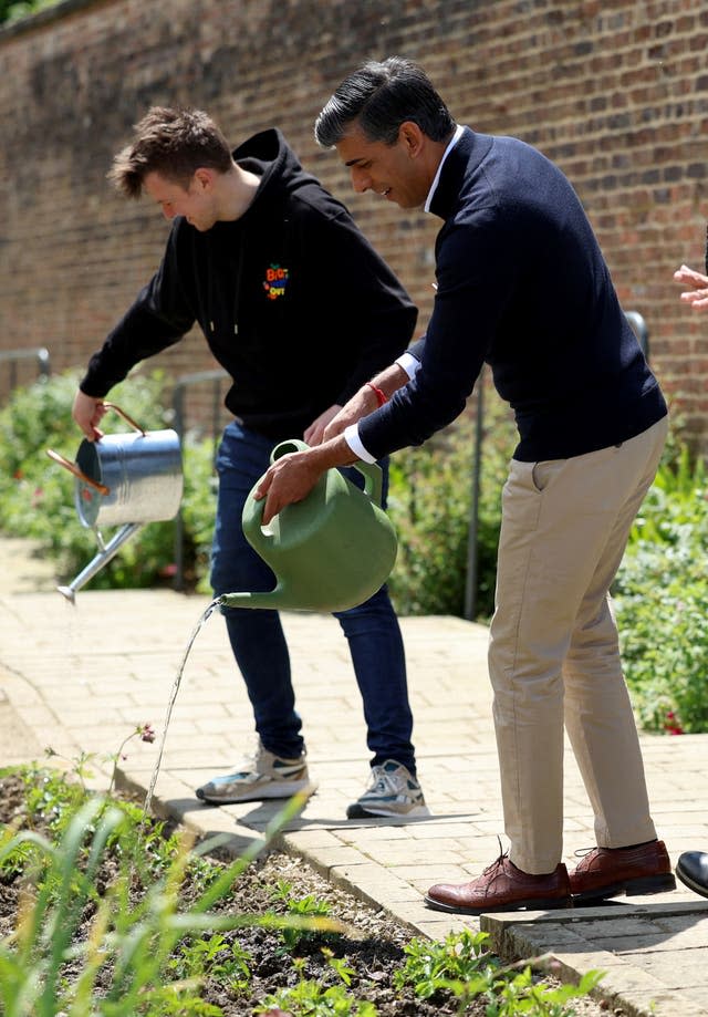 Rishi Sunak during a visit to a Big Help Out project in a walled garden in Bishop Auckland