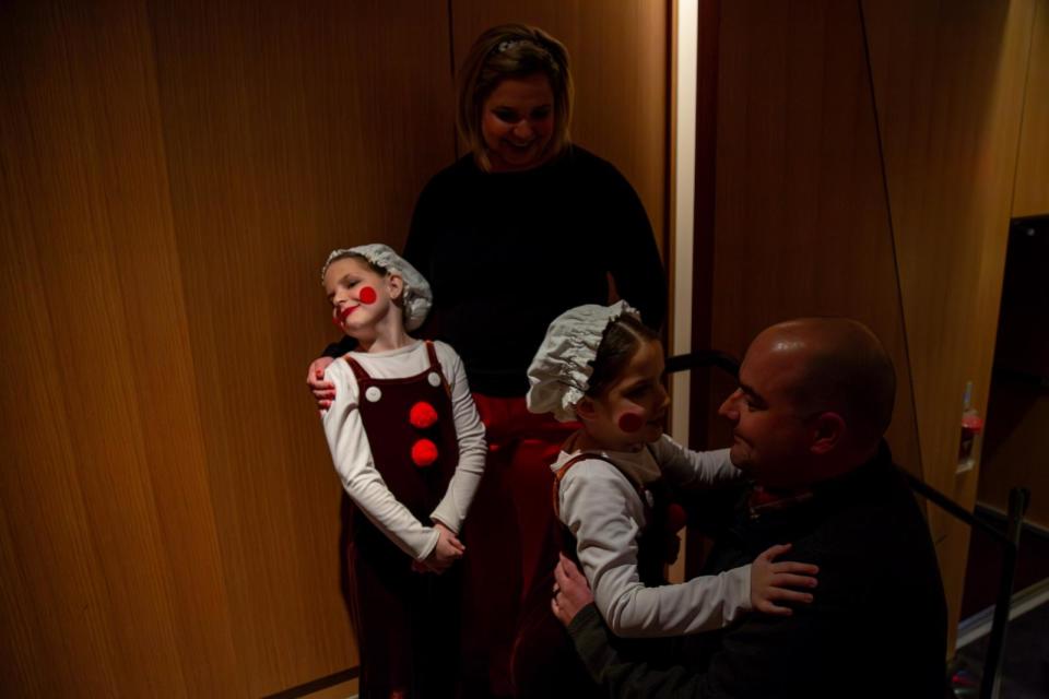 PHOTO: Aubrey, 7, Scaletta meets her parents after her ballet performance in 'The Nutcracker' at the Moss Arts Center on Dec. 8, 2023, in Blacksburg, Va. Aubrey danced just months after nearly losing her feet in a life-threatening accident. (Scott P. Yates/Carilion Clinic)