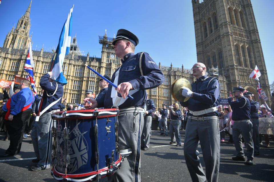 <p>A band march through Westminster in protest of Brexit (PA) </p>