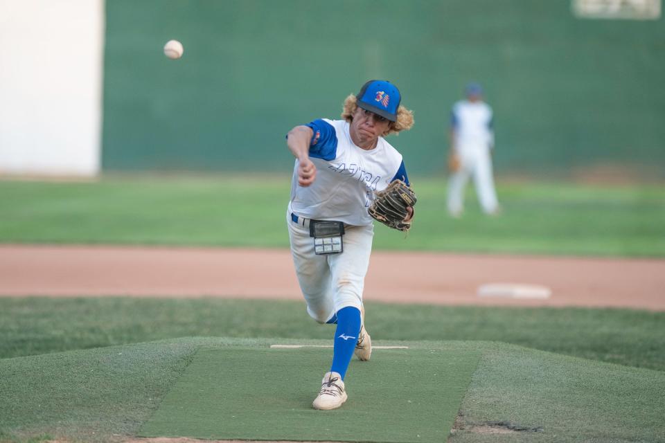 Pueblo Azteca’s Michael Casillas fires off a pitch during a game against Greeley GoJo on the first day of the 42nd annual Andenucio Memorial Baseball Tournament on Thursday, June 16, 2022.