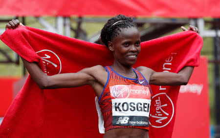 Athletics - London Marathon - London, Britain - April 28, 2019 Kenya's Brigid Kosgei celebrates winning the women's elite race REUTERS/Paul Childs