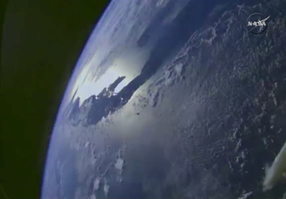 Earth's limb shines in an image sent by NASA's Orion spacecraft after it passes over the Gulf of Mexico on its first uncrewed test flight, Dec. 5, 2014.