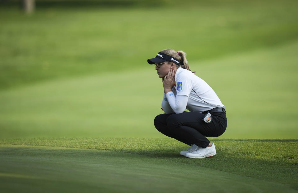 Brooke Henderson, of Canada, waits to putt on the 10th hole during the first round of the LPGA CPKC Women's Open golf tournament in Vancouver, British Columbia, Thursday, Aug. 24, 2023. (Darryl Dyck/The Canadian Press via AP)