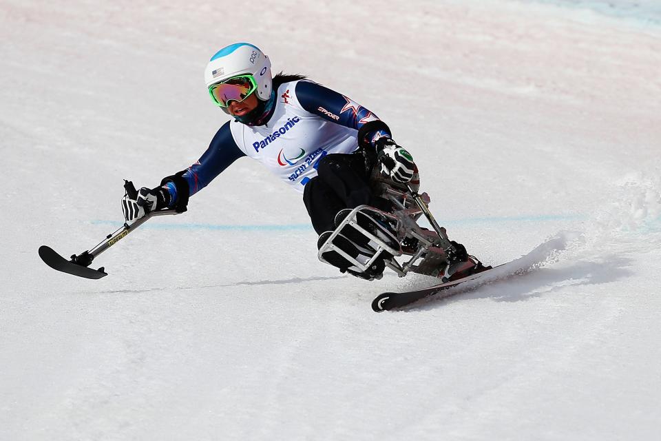 Alana Nichols competing in downhill sitting during the Sochi 2014 Paralympics