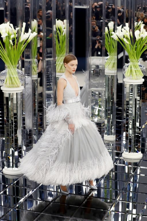 A model presents a creation for Chanel during the 2017 spring/summer Haute Couture collection on January 24, 2017 in Paris