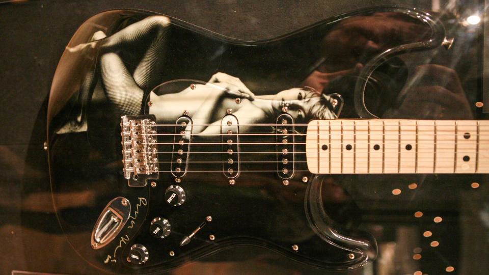 Harrods Rocks Exhibition of customised guitars by rock and pop ledgends and famous designers, Bryan Adams photograph of Kate Moss - 18th February 2006. Job: 19893 Ref: JHY - (Photo by John Horsley/Avalon/Getty Images)