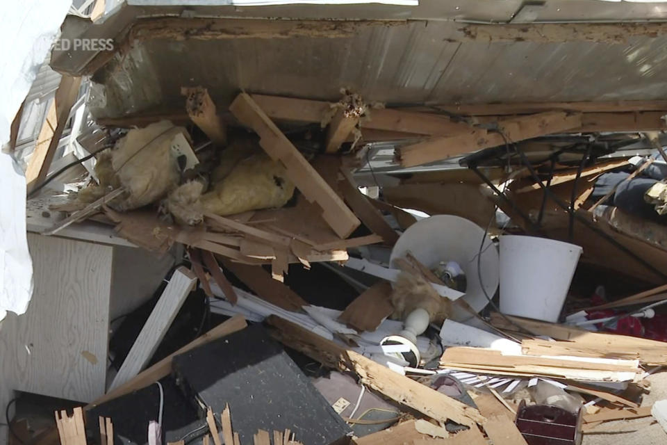 In this image made from video, debris lies scattered at a home on Thursday, Sept. 29, 2022, after Hurricane Ian hit North Fort Myers, Fla. (AP Photo)