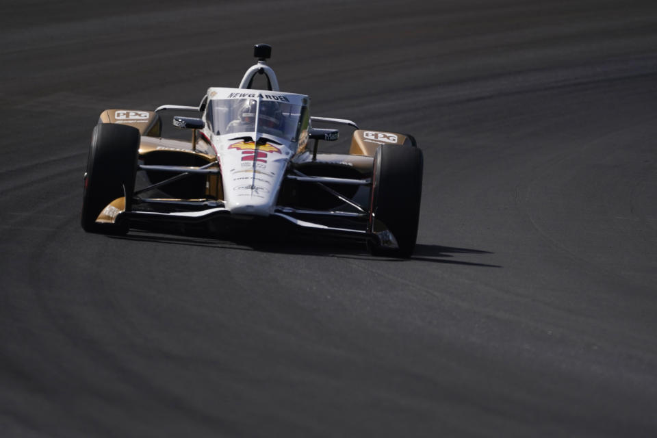 Josef Newgarden drives into Turn 1 during testing at Indianapolis Motor Speedway, Thursday, April 21, 2022, in Indianapolis. (AP Photo/Darron Cummings)