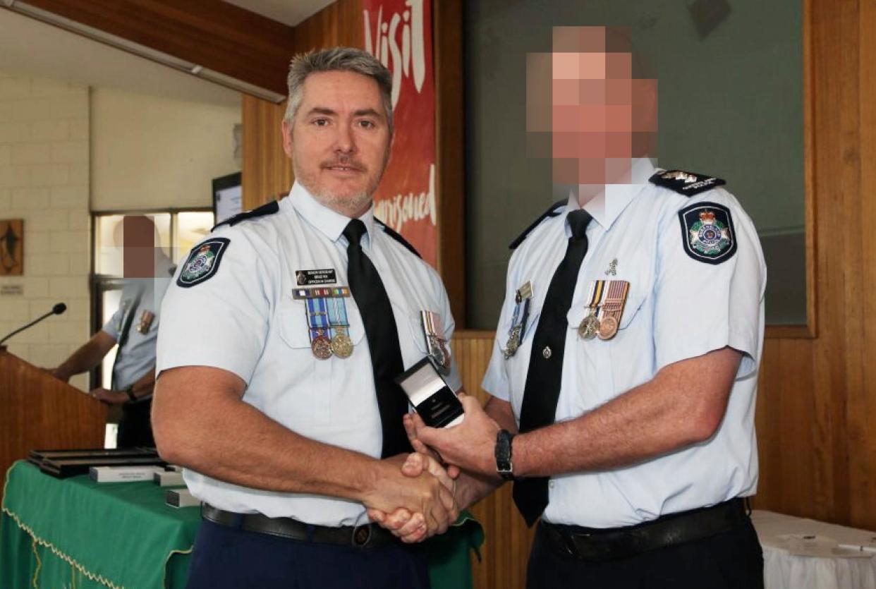 <span>Queensland police officer Brad Rix (left) said the Instagram post was ‘good natured and satirical humour, without any intent or seriousness’.</span><span>Photograph: Queensland police</span>