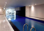 <p>Guests can also use the building’s amenities, like the gym and indoor pool.<br>(Airbnb) </p>