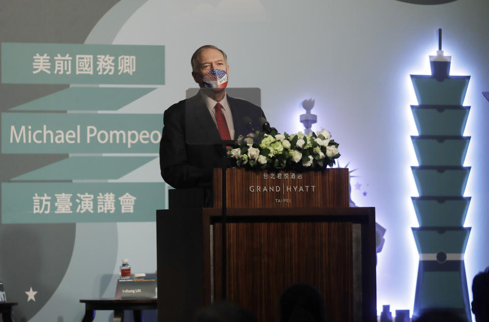 Former U.S. Secretary of State Mike Pompeo delivers a speech during his four-day trip to Taiwan in Taipei, Taiwan, Friday, March 4, 2022. (AP Photo/Chiang Ying-ying)