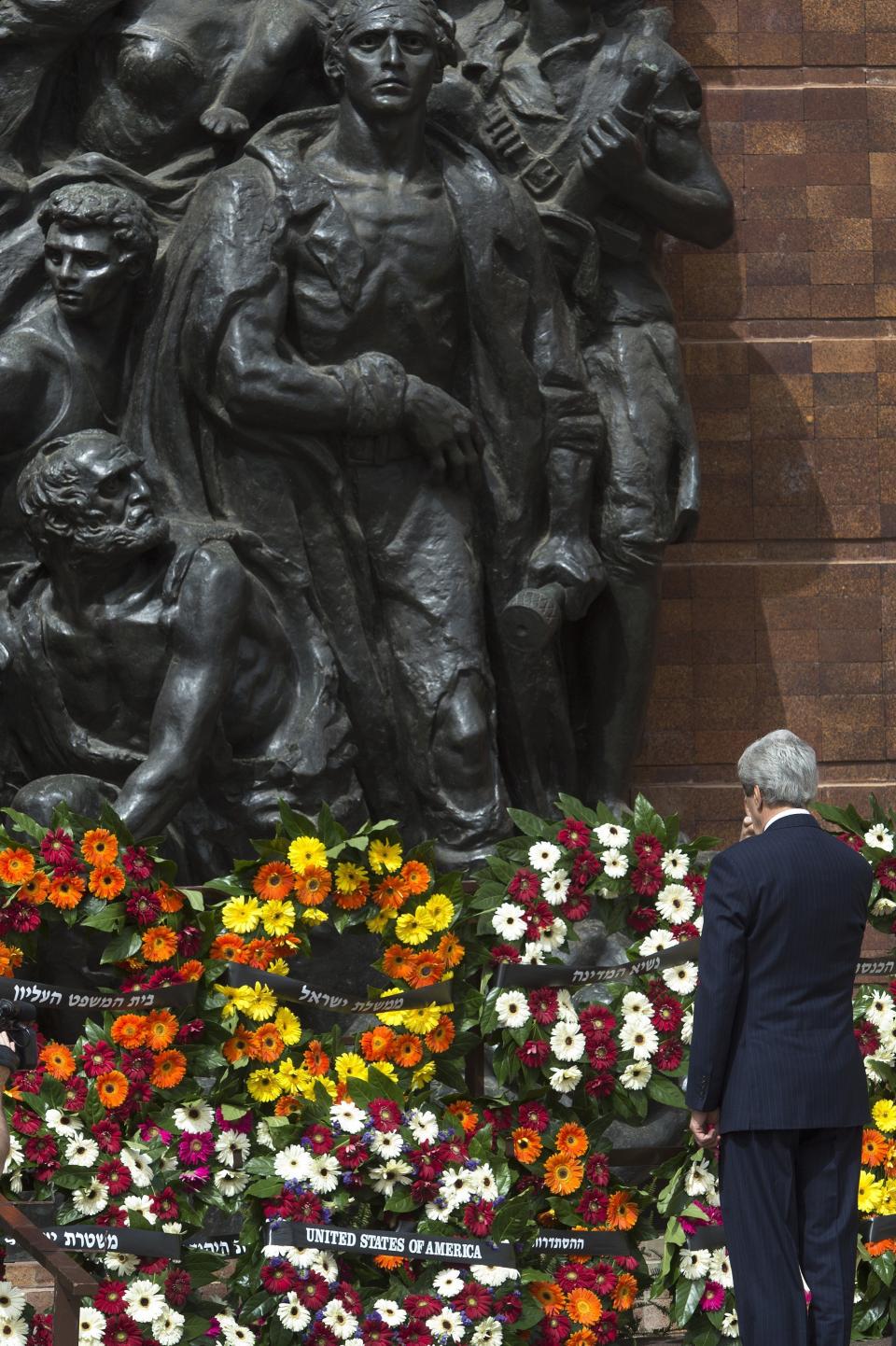 U.S. Secretary of State John Kerry reflects for a moment after placing a wreath from the United States at the Yad Vashem memorial during Holocaust Remembrance Day in Jerusalem, Israel Monday, April 8, 2013. (AP Photo/Paul Richards, Pool)