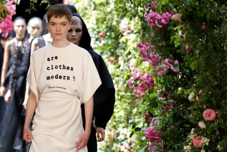 Models present creations by designer Maria Grazia Chiuri as part of her Haute Couture Fall/Winter 2019/20 collection show for fashion house Dior in Paris