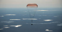 <p>The Soyuz MS-02 spacecraft is seen as it lands with Expedition 50 Commander Shane Kimbrough of NASA and Flight Engineers Sergey Ryzhikov and Andrey Borisenko of Roscosmos near the town of Zhezkazgan, Kazakhstan on Monday, April 10, 2017 (Kazakh time). Kimbrough, Ryzhikov, and Borisenko are returning after 173 days in space where they served as members of the Expedition 49 and 50 crews onboard the International Space Station. (Photo: NASA/Bill Ingalls) </p>
